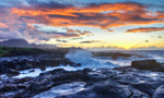 Watch the sunset over the serene waters of Turtle Bay, on the northern tip of Oahu, home of the protected green sea turtle.